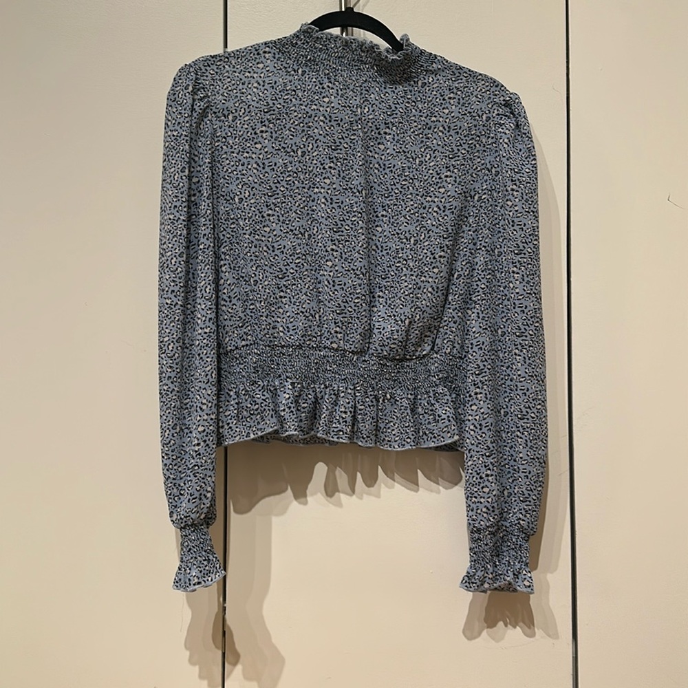 Lucy Paris size small blue cheetah print work blouse